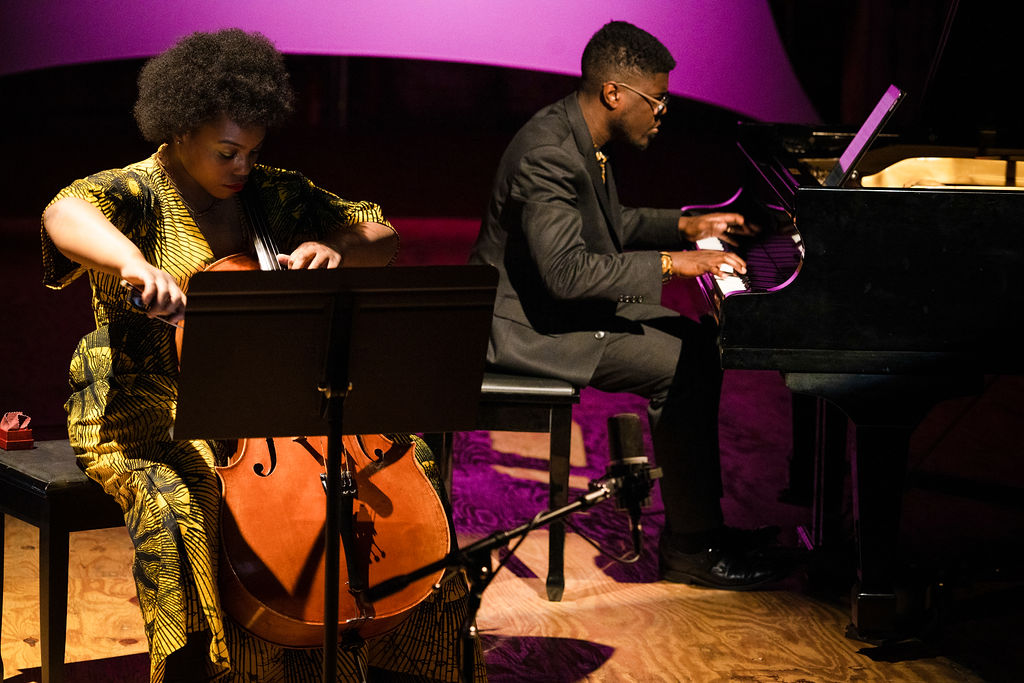 Dara Hankins and Kyle P. Walker performing together